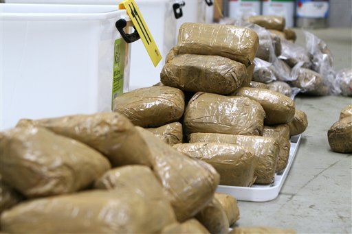 Packages containing methamphetamine are stacked in a warehouse in Melbourne, Australia. (AP Photo/Australian Federal Police, HO)
