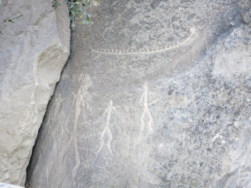 Cave carving with people and ship, Gobustand National Park 